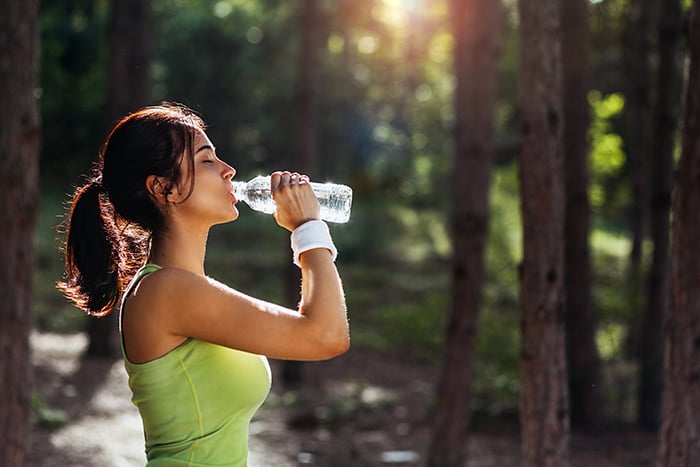 Can You Remove Nicotine From Your Body Faster - Girl Drinking Water